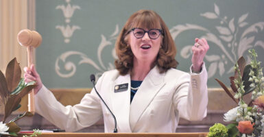 Julie McCluskie in white