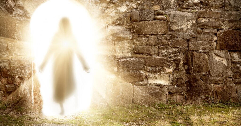 A resurrected Jesus is walking covered in light.