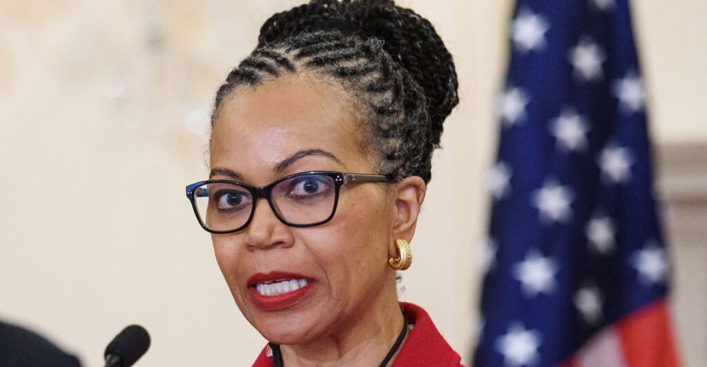 Former State Department head of diversity and inclusion Gina Abercrombie-Winstanley, a black woman wearing red.