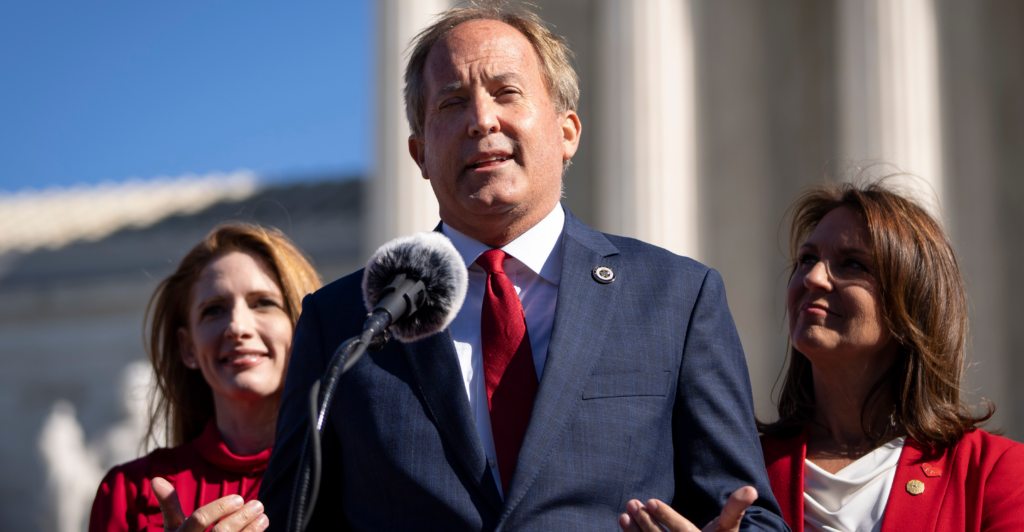 Texas Attorney General Ken Paxton speaks outside the U.S. Supreme Court on Nov. 1, 2021.