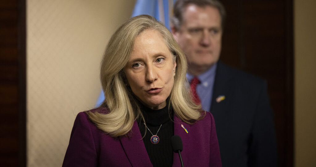 Then-congresswoman Abigail Spanberger purses her lips during a press conference while on a 2024 Congressional fact-finding trip to Kyiv, Ukraine.