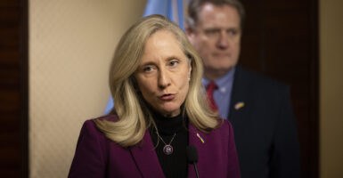 Then-congresswoman Abigail Spanberger purses her lips during a press conference while on a 2024 Congressional fact-finding trip to Kyiv, Ukraine.