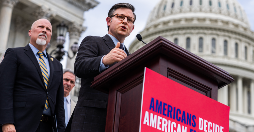 House Speaker Mike Johnson, R-La., speaks at a news conference on the SAVE Act, with its sponsor, Rep. Chip Roy, R-Texas (left), looking on outside the Capitol on May 8, 2024.