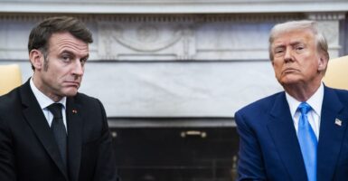 President Donald Trump, on the right, and French President Macron sit on the Oval Office looking forlorn.