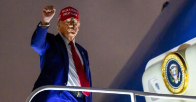 President Donald Trump boarding Air Fordce One after dark