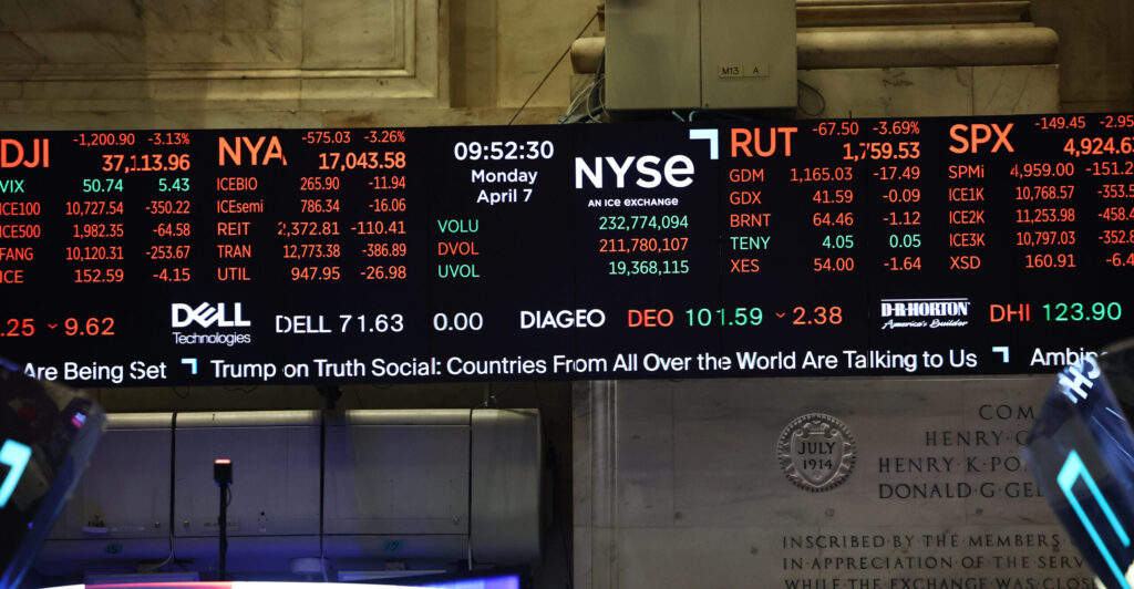 Digital display of New York Stock Exchange board early Monday, with assorted stock prices and news ticker on bottom of screen.