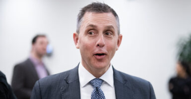 Close up of a wide-eyed North Dakota Gov. Kelly Armstrong.