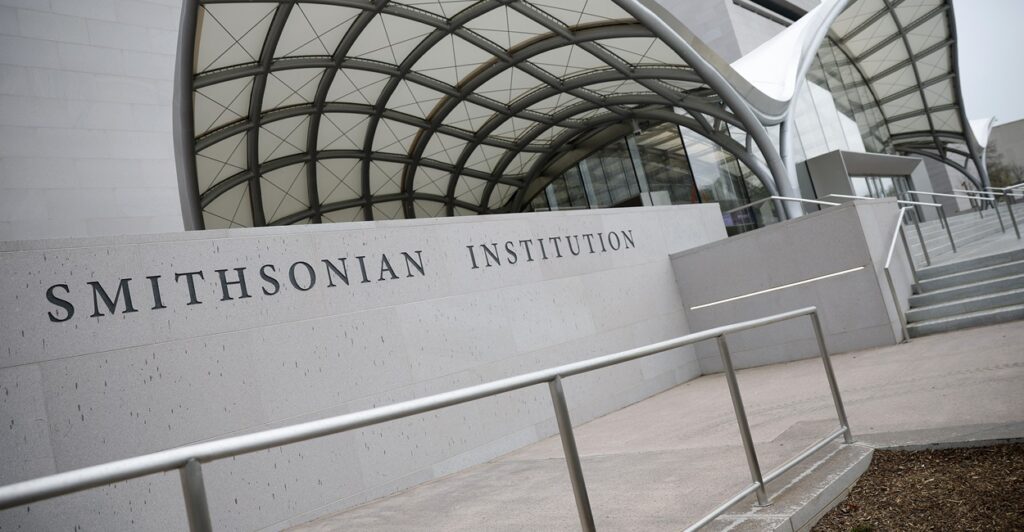 A Smithsonian Institution sign is seen on the National Air and Space Museum on the National Mall.