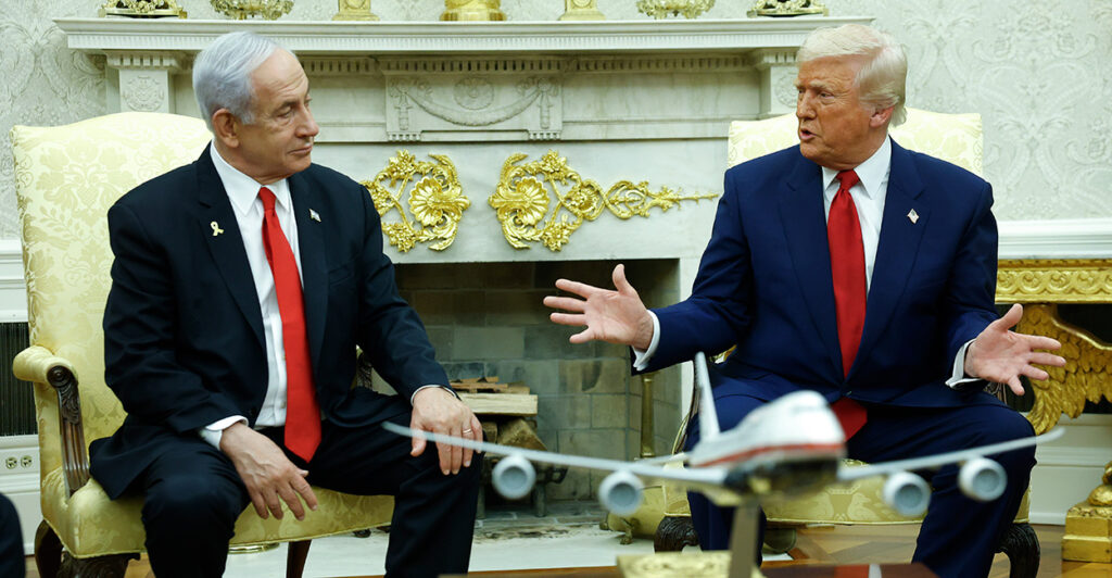 President Donald Trump confers with Israeli Prime Minister Benjamin Netanyahu at the White House on Monday.