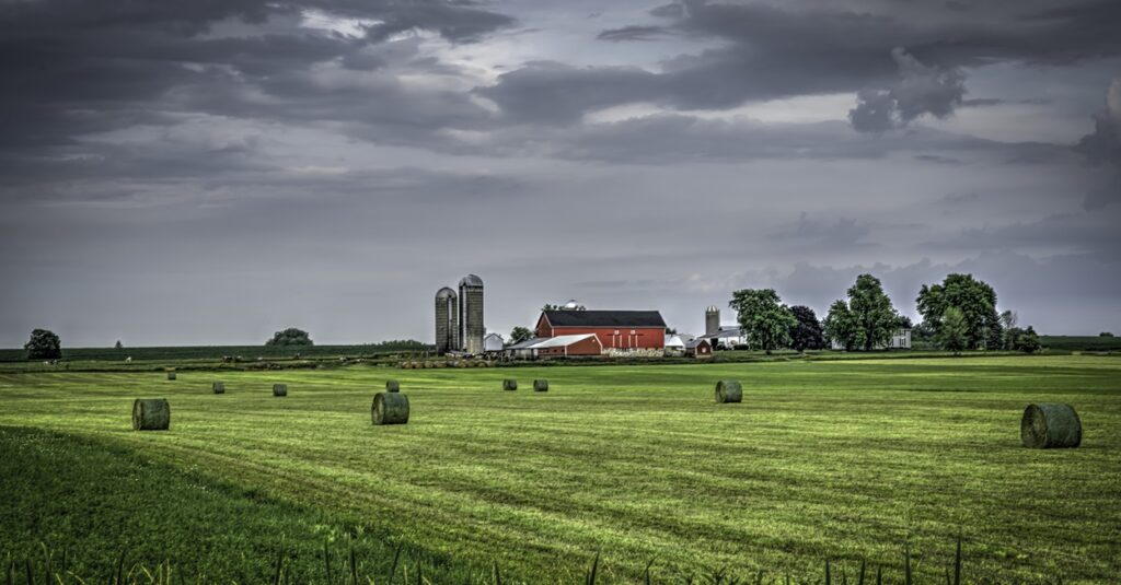 A barn is set back on a farm in Wisconsin.