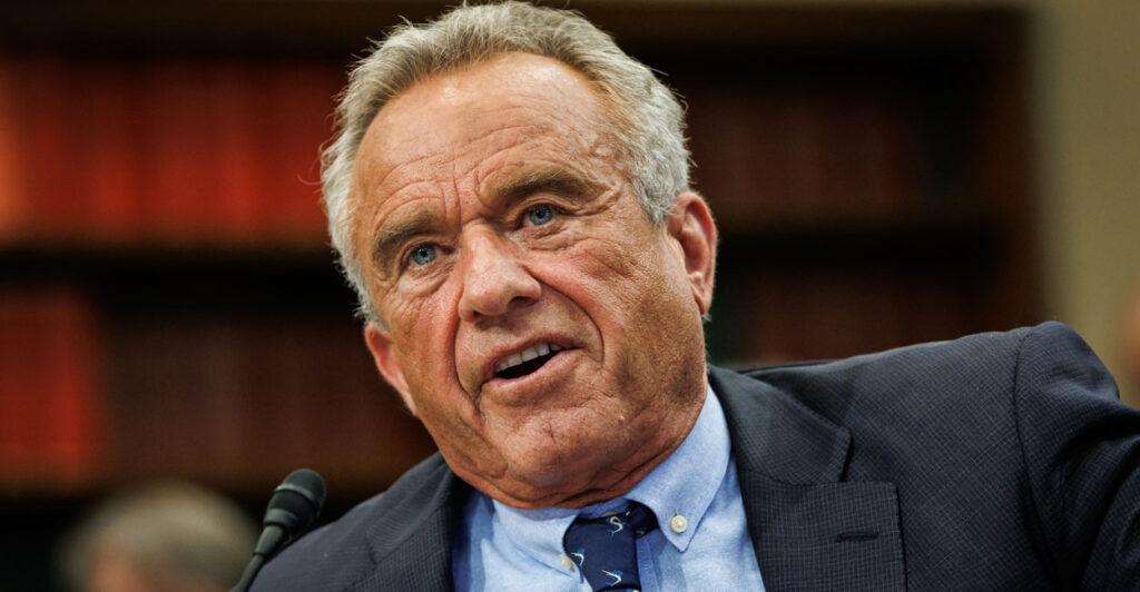 Close-up of HHS Secretary Robert F. Kennedy as he testifies at a House hearing.