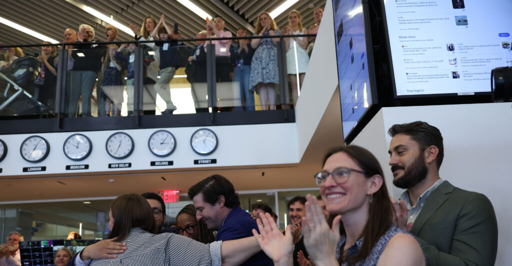 Staff members of The Washington Post celebrate winning a 2025 Pulitzer Prize on Monday.