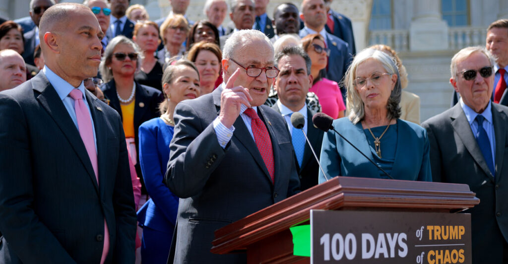 Senate Minority Leader Charles Schumer, D-N.Y. (center), House Minority Leader Hakeem Jeffries, D-N.Y. (left), and fellow Democratic lawmakers critique the first 100 days of President Donald Trump's second term in the White House outside the Capitol on April 30.