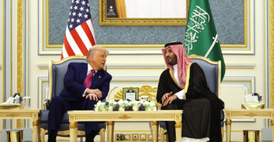 President Donald Trump confers with Saudi Crown Prince Mohammed bin Salman during a coffee ceremony at the Saudi Royal Court in Riyadh, Saudi Arabia, on Tuesday.
