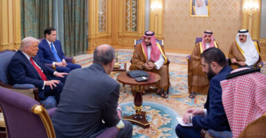President Donald Trump and Secretary of State Marco Rubio confer with Saudi Crown Prince Mohammed bin Salman (center), Syrian President Ahmad al-Sharaa (right front) and others in Riyadh, Saudi Arabia, on Wednesday.