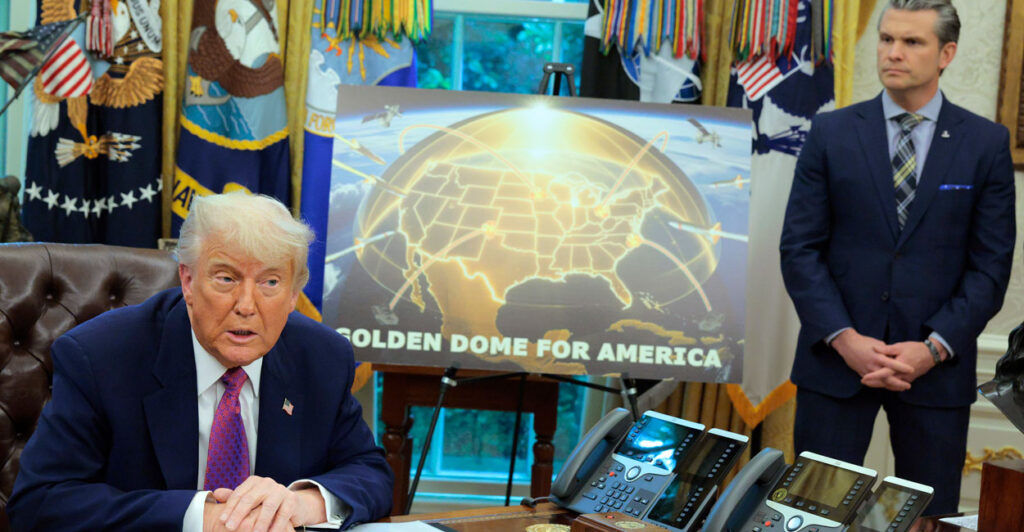 President Donald Trump and Secretary of Defense Pete Hegseth, in the Oval Office on Tuesday, unveil plans for a missile-defense shield system, with an artist's rendering of what it would look like between them.
