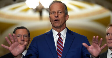 Senate Majority Leader John Thune, R-S.D., speaks to reporters at the Capitol on May 13.