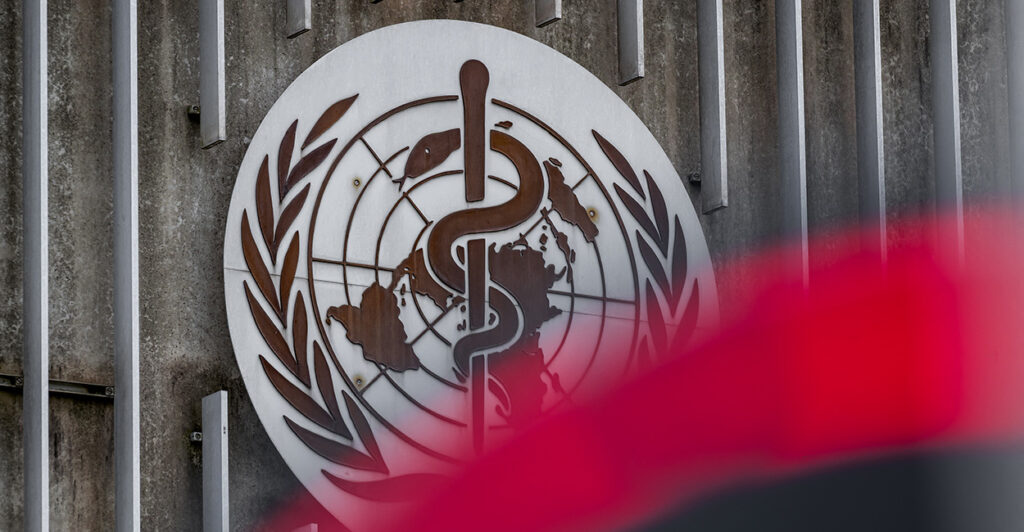 The World Health Organization logo next to its headquarters in Geneva, Switzerland.