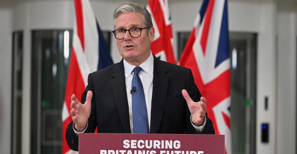 Keir Starmer behind a podium.