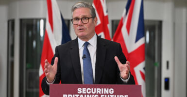 Keir Starmer behind a podium.