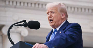 Donald Trump in a blue suit at Arlington National Cemetery