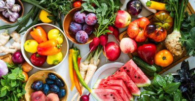 An overhead shot of a load of fruits and vegetables.