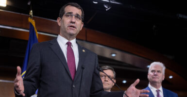 Derek Schmidt in a suit