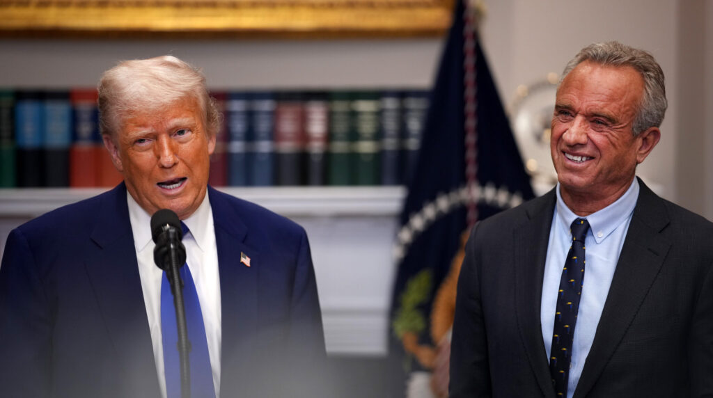 President Trump with HHS Secretary Robert F. Kennedy, Jr. at his side in Roosevelt Room of the White House, announcing effort to lower drug prices