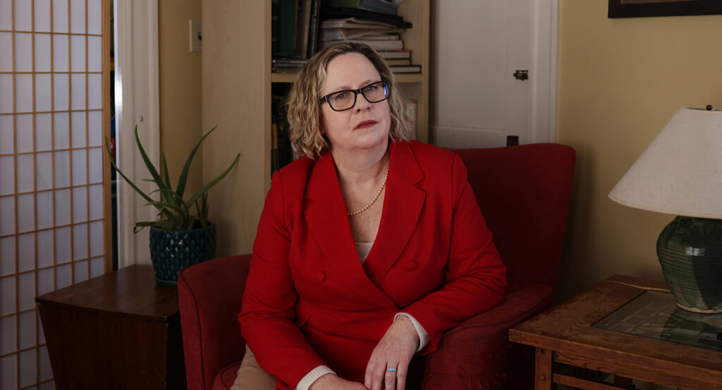 Kerry Doyle in a red suit