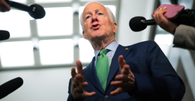 Sen. John Cornyn, R-Texas, speaks with reporters on April 7 in Washington.