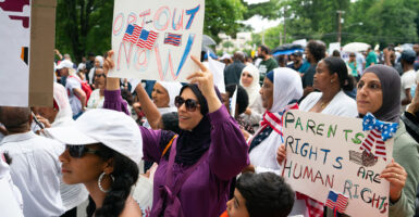 Moms protest, demanding an opt-out for LGBTQ book lessons