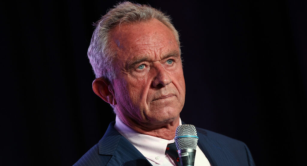 Robert F. Kennedy Jr. holding a microphone