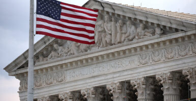 An American flag is seen flying outside the Supreme Court.