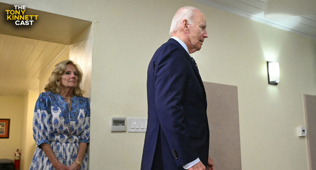 Joe Biden walks away as wife Jill Biden looks on.