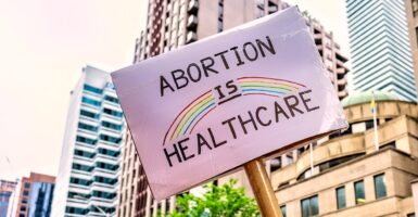 A pro-abortion sign says, "Abortion is healthcare."