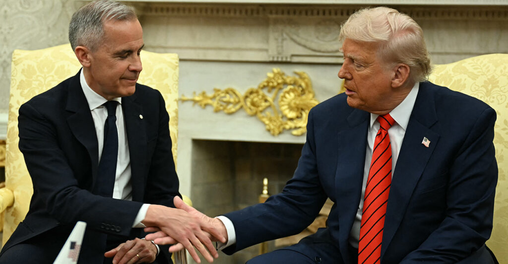 President Donald Trump confers with Canadian Prime Minister Mark Carney in the Oval Office of the White House on Tuesday.