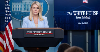White House Press Secretary Karoline Leavitt in a light blue suit holds press briefing at the White House.