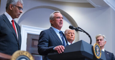 Health and Human Services Secretary Robert F. Kennedy Jr. speaks as National Institutes of Health Director Dr. Jay Bhattacharya (left), Administrator for the Centers for Medicare & Medicaid Services Dr. Mehmet Oz (right), and President Donald Trump look on at the White House May 12.