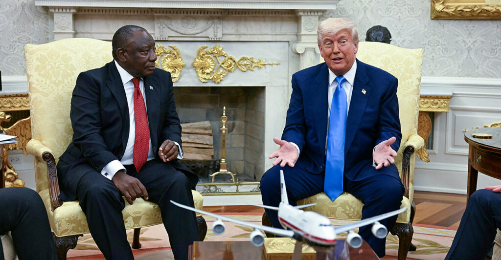 President Donald Trump confers with South African President Cyril Ramaphosa in the Oval Office on Wednesday.