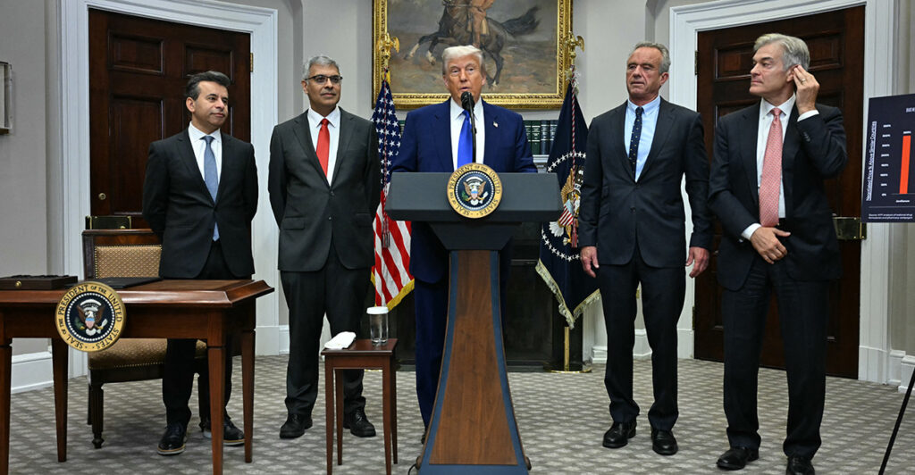 President Donald Trum, alongside (L-R) FDA Commissioner Marty Makary, National Institute of Health (NIH) Director Jayanta Bhattacharya, Secretary of Health and Human Services Robert F. Kennedy Jr and Administrator for the Centers for Medicare and Medicaid Services Mehmet Oz, speaks during a news conference about prescription drug prices, in the White House on May 12.