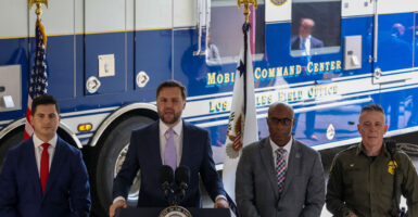 With an FBI mobile command center van as backdrop, from left, U.S. Attorney for the Central District of California Bill Essayli, Vice President JD Vance, FBI Los Angeles Assistant Director Akil Davis, and U.S. Border Patrol Sector Chief Gregory Bovino speak to reporters during Vance's visit to Los Angeles on June 20.