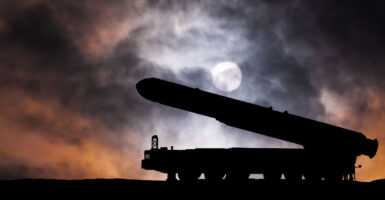 Intercontinental Ballistic Missile at dramatic sunset.