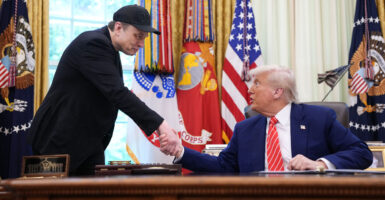 Before their falling out, Elon Musk is given a warm send-off with a handshake from President Donald Trump in the Oval Office on May 30.