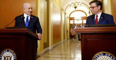 Speaker Mike Johnson, R-La. (right), and Israeli Prime Minister Benjamin Netanyahu speak to reporters at the U.S. Capitol last July 24.