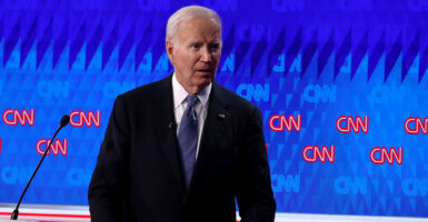 A dazed Joe Biden departs the stage at his 2024 presidential debate with Donald Trump on CNN.