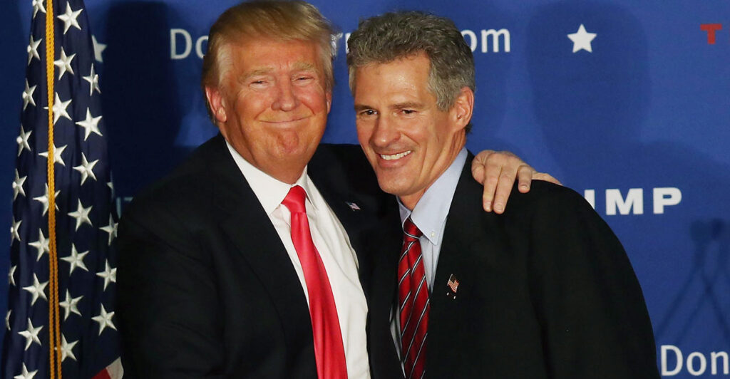 President Donald Trump embraces former Sen. Scott Brown, who is seeking a return to the Senate.