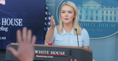 White House Press Secretary Karoline Leavitt stands at the podium in the press room at the White House taking questions from the media