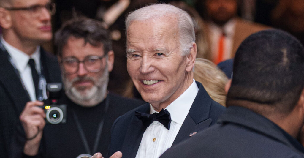 Joe Biden smiles in a tux