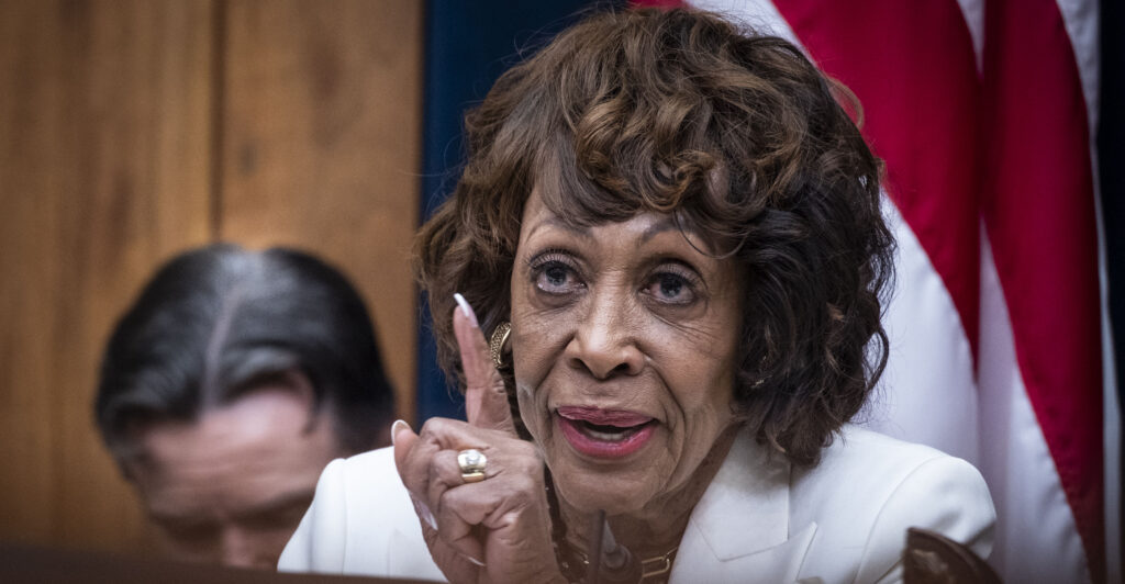 Rep. Maxine Waters, D-Calif., wags a finger at someone.