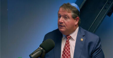 Sporting a yarmulke, Rep. Randy Fine, R-Fla., sits for an interview.